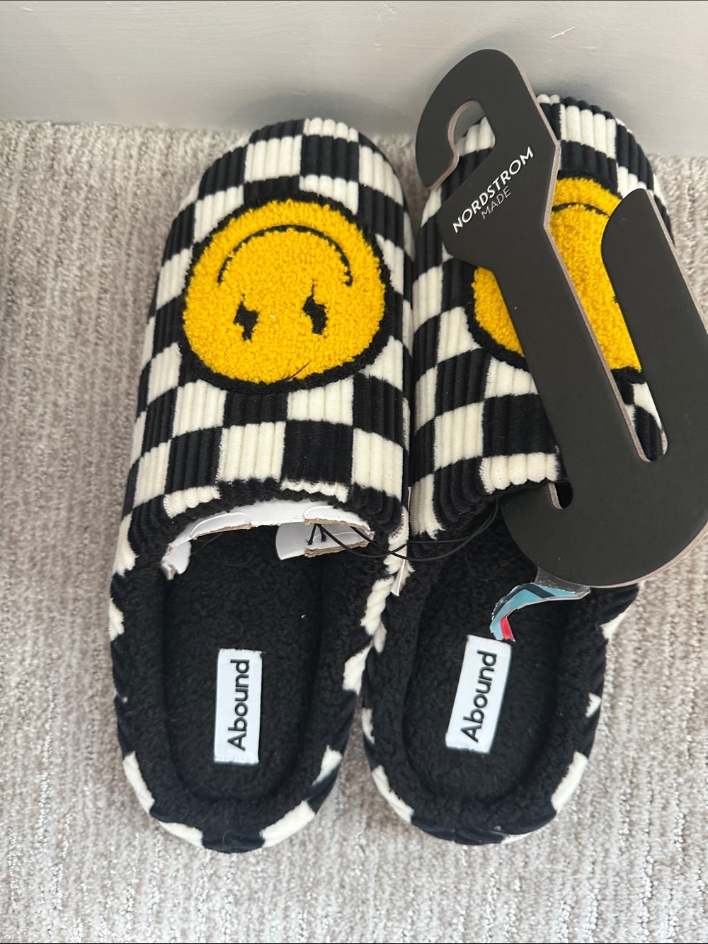 Abound Black & White Checker Smiley Slip-Ons with Yellow Emblem